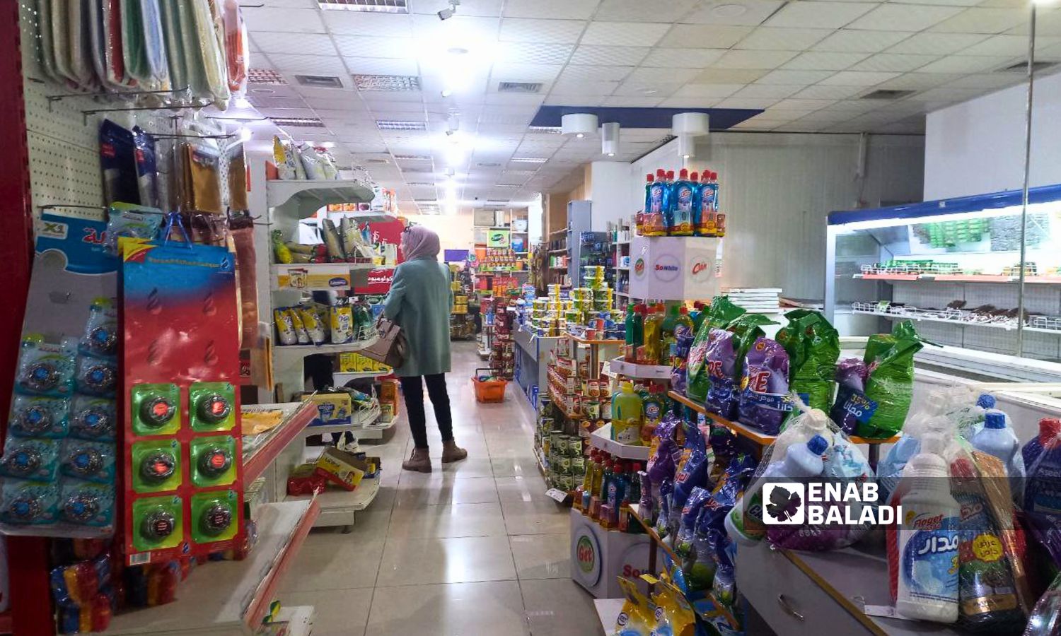محل لبيع المواد الغذائية في درعا المحطة- 18 من آذار 2024 (/سارة الأحمد)